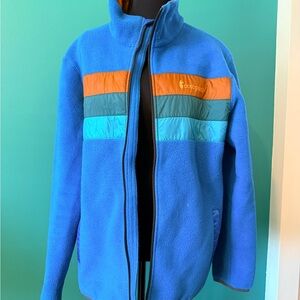 Cotopaxi Vibrant Blue Fleece with Orange and Teal Stripes